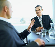 A business broker from New Jersey in a meeting